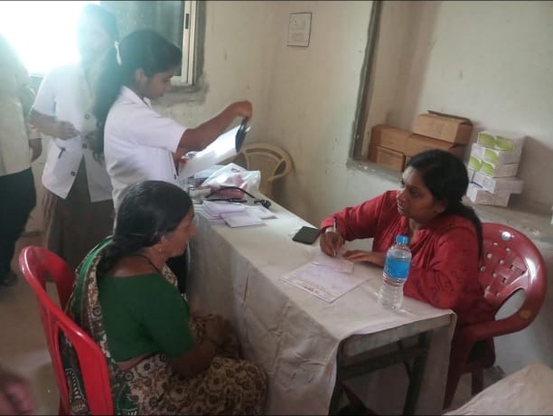 Patient examination at a cancer screening camp